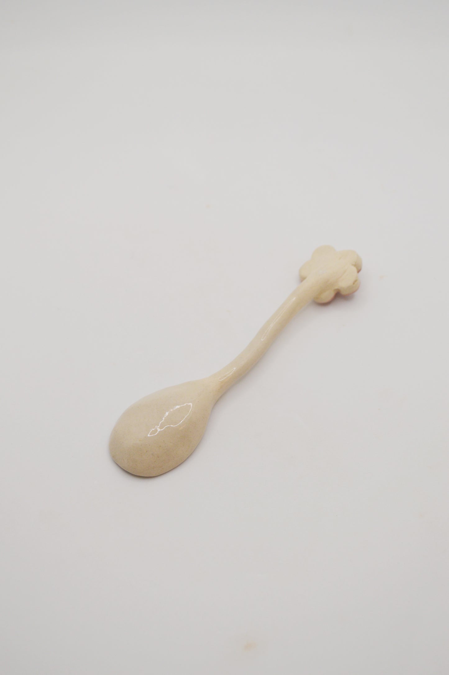 Cuillère crème fleur rose